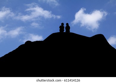 Man on top of a mountain