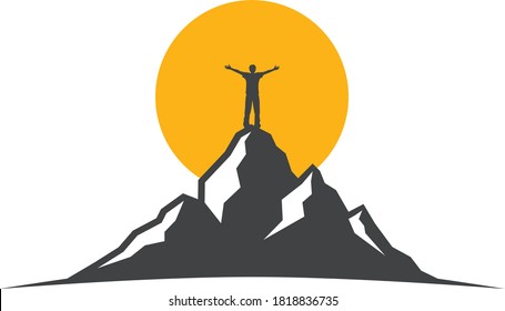 Man on top of the mountain hands wide open with sunrise background, silhouette of a person stands on peak of a hill in front of sunset cheering for success