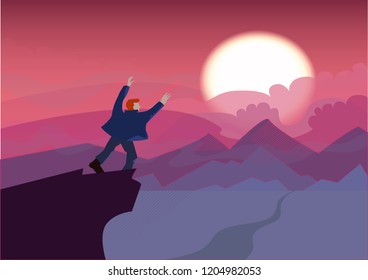 The man on top of the mountain looking at the panorama. Landscape with sunset. man stands with his arms outstretched