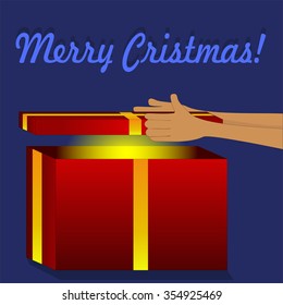 Man opening gift at Christmas