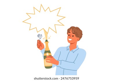 Man opens champagne and sees splash of alcoholic drink during festive christmas party. Bottle of champagne or sparkling wine in hands of waiter or bartender looking at copy space with smile