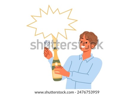 Man opens champagne and sees splash of alcoholic drink during festive christmas party. Bottle of champagne or sparkling wine in hands of waiter or bartender looking at copy space with smile