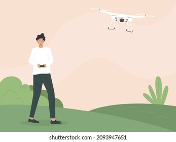 Man operating a hovering drone with a remote control