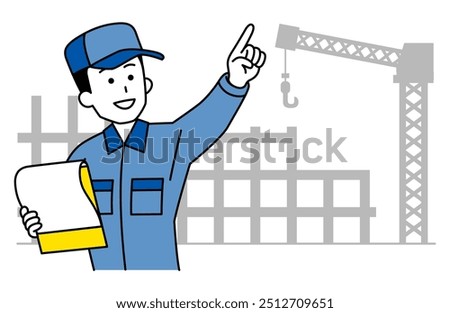 Man in overalls giving instructions while looking at documents at a construction site
