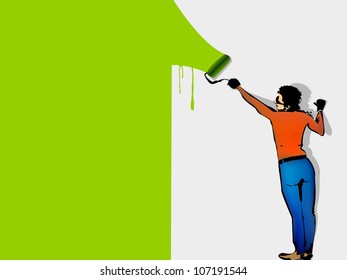 man paints the wall by roller