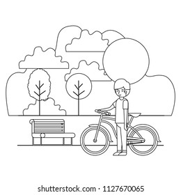 man in the park with bicycle