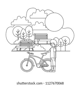 man in the park with bicycle
