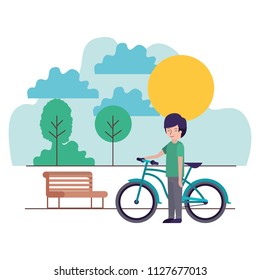 man in the park with bicycle
