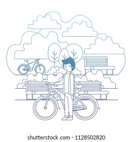man in the park with bicycle