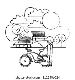 man in the park with bicycle