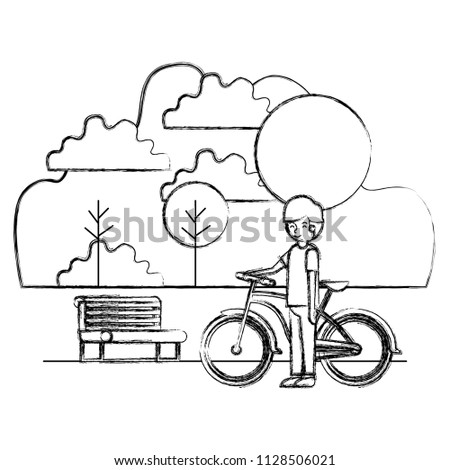 man in the park with bicycle