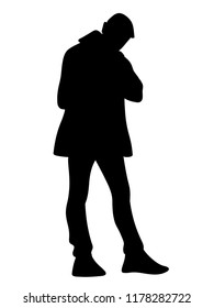 Man in a pensive manner. Stencil. Black silhouette on white background. Concept. Illustration of standing thoughtful man bowed his head. Monochrome minimalism. 