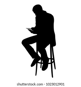 A man with a phone, a mobile phone, a silhouette on a white background