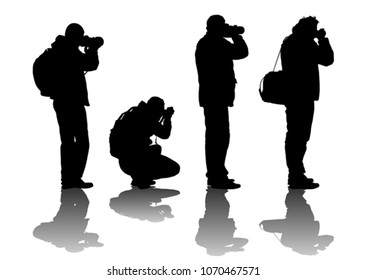 Man with a photo camera on white background