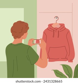 Mann fotografiert roten Kapuzenpullover auf Kleiderbügel, um online zu verkaufen. Person fängt Sweatshirt mit seinem Telefon. Konzept des Wiederverkaufs von Bekleidung. Flache Vektordarstellung.