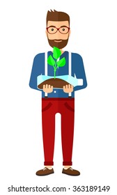 Hombre con planta creciendo en botella.