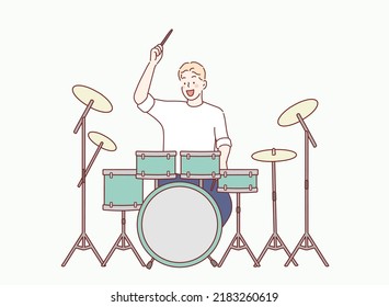 man playing drums, drummer. Hand drawn style vector design illustrations.