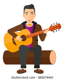 Man playing guitar.