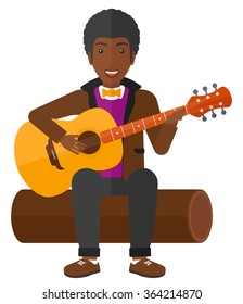 Man playing guitar.