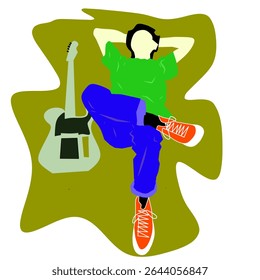man playing guitar , lying on the grass