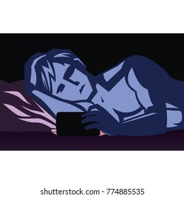 a man playing a mobile phone in bed