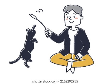 A man playing with pet cats and toys Happy time with an animal family