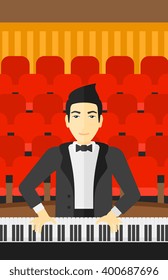 Mann spielt Klavier.