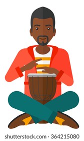 Man playing tamtam.