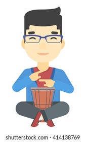 Man playing tomtom.