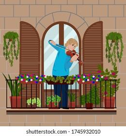 A man plays the violin. The violinist plays the violin on the balcony with flower pots by the window and decorative shutters. banner for online concerts, street performances and bards.