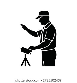 Man pointing with camera on tripod silhouette