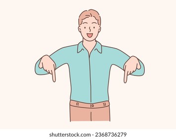 man pointing down with two hands