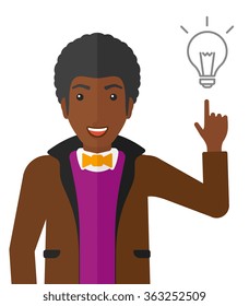 Man pointing at light bulb.