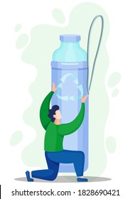 A man points with his hands to a large recycling logo depicted on a reusable bottle. Large plastic container of water with recycling logo image stands on background. Eco friendly production
