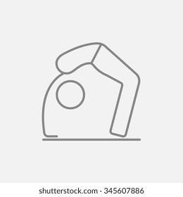 A man practicing yoga chakrasana pose line icon for web, mobile and infographics. Vector dark grey icon isolated on light grey background.