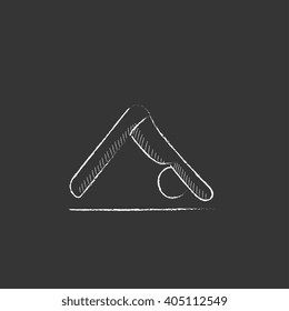 Man practicing yoga. Drawn in chalk icon.