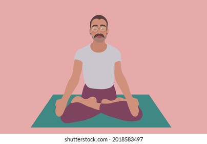 A man practicing yoga in the lotus position