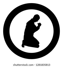 Man pray on his knees silhouette icon black color vector illustration flat style simple imagein circle round