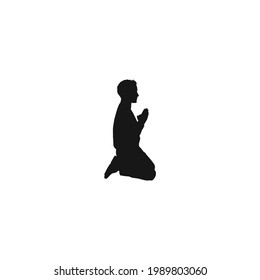 Man praying silhouette icon vector on a white background