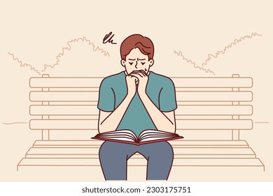 Man prays reads holy bible or gospel sitting on bench in public park. Believing guy turns to god and prays asking almighty from christian or catholic religion for help in solving problems