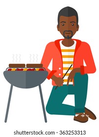 Man preparing barbecue.