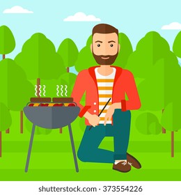 Man preparing barbecue.