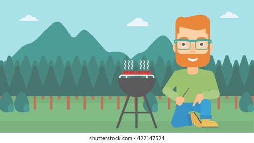 Hombre preparando parrillada.