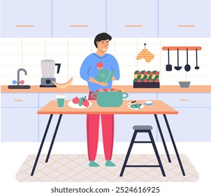 Homem preparando refeição na mesa da cozinha. Cara com livros de receitas lendo receitas vegetarianas. Nutrição adequada, estilo de vida saudável, alimentação caseira, conceito de vegetarianismo. Processo de cozimento do prato saudável