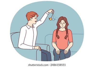 Man psychotherapist hypnotizes woman patient using pendulum to solve psychological problems in subconscious. Guy hypnotizes girl to take advantage unconscious state or remove information from memory