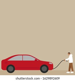 A man pulls a car on a rope