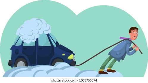 a man pulls a car stuck in the snow