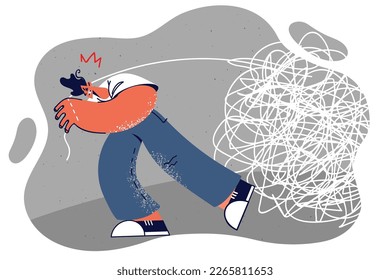 Man pulls large clot symbolizing problems from past that make it difficult to move forward and cause discomfort. Concept of crisis management and attempts to solve financial problems causing chaos 