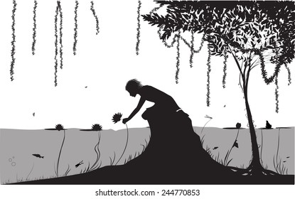 man pulls the lily on beautiful river bank in rain forest, shadows