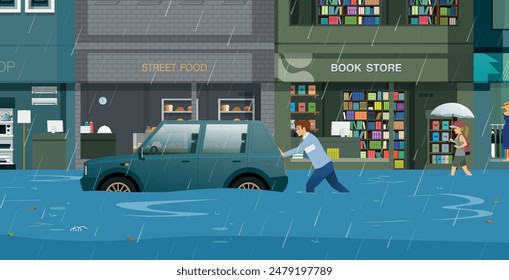 A man was pushing a car that had been damaged by rain and flooding.